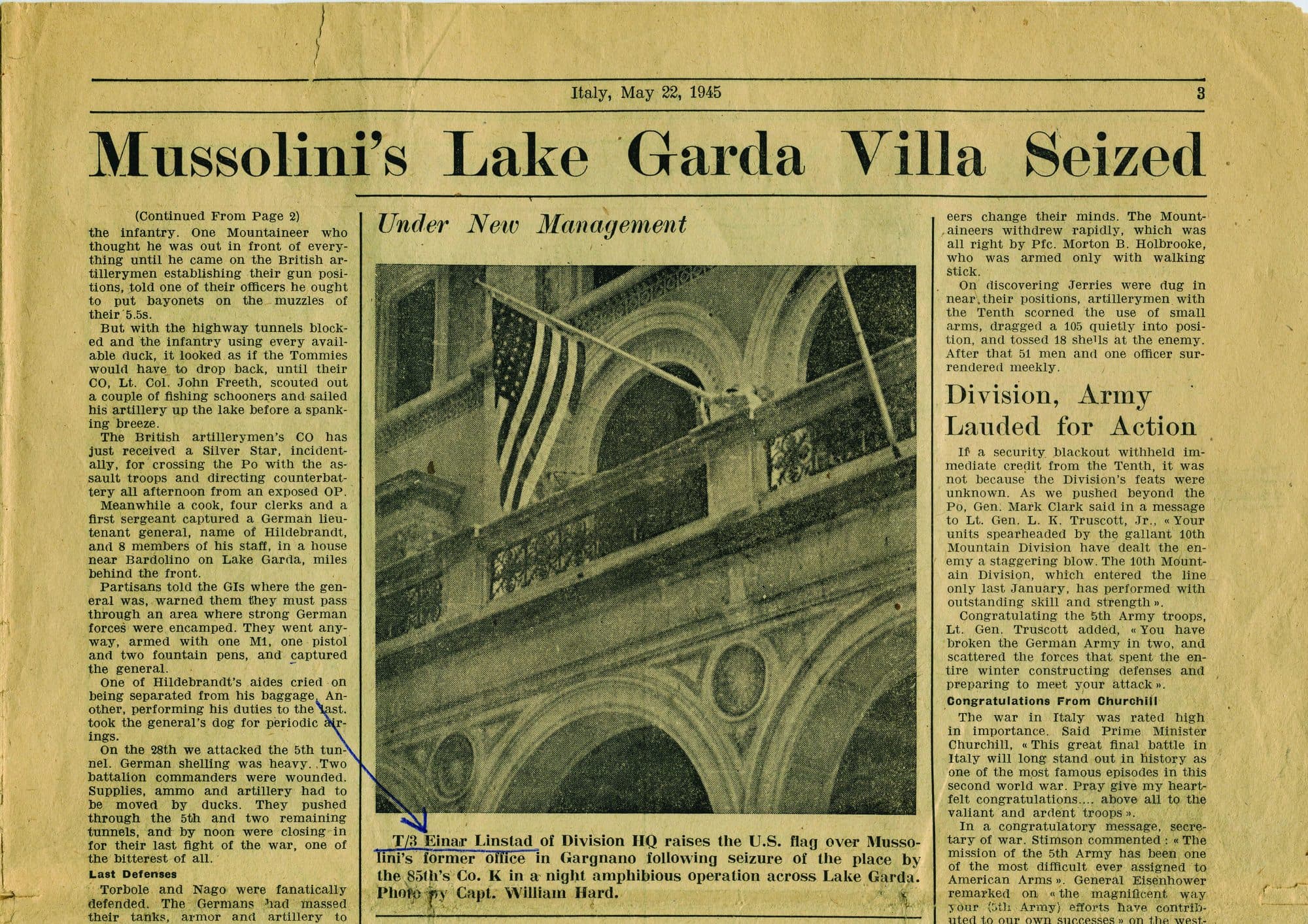 A wartime newspaper clipping reporting the seizure of Mussolini's villa on Lake Garda
